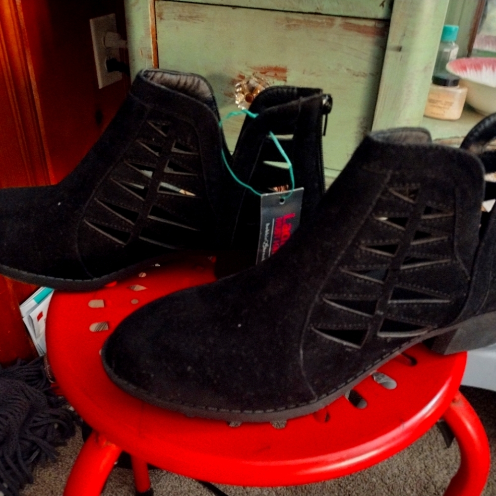 Black boots with slits up the sides brand new